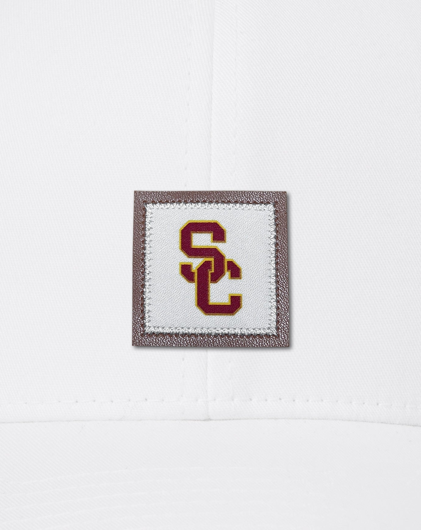 TravisMathew | USC Leather Patch Snapback Hat
